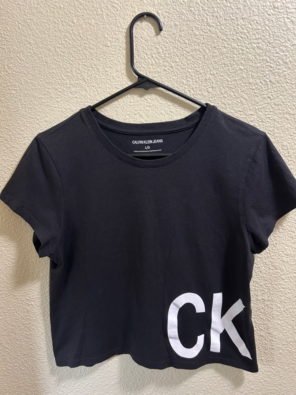 Calvin Klein Jeans Black Crop Tee with White CK Hem Logo